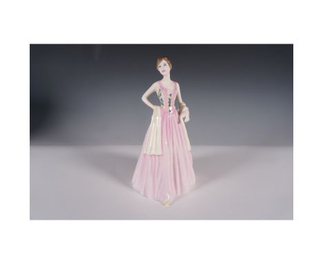 Royal Doulton figurine April HN4520 from the Classics collection, crafted from fine bone china. Produced in England, this han