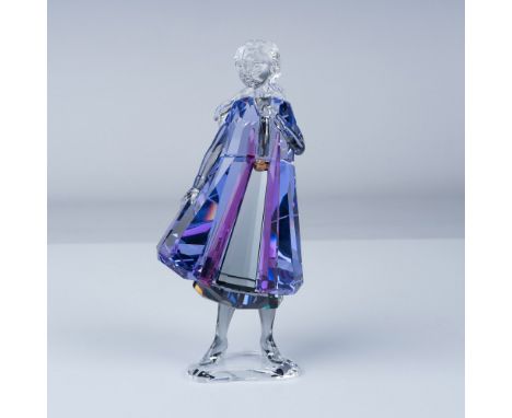 Presenting a stunning Swarovski crystal figurine of Anna from Disney's Frozen II. This exquisite piece captures Anna in her i