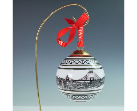 This Halcyon Days Gump’s San Francisco ornament showcases an elegant depiction of the Golden Gate Bridge and classic San Fran