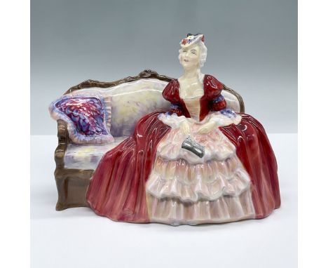 From the Dance Theme series, features a seated lady dressed in a red gown with a mask at hand. Royal Doulton backstamp.Artist