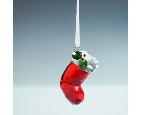 Beautifully crafted in traditional seasonal colours, it comes on a white satin ribbon. Use it to decorate your Christmas tree