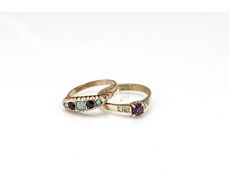 A sapphire and opal 9ct gold five stone ring, the circular cut sapphires set with three cabochon opals, 2g, ring size Q toget