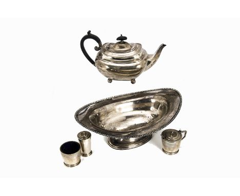 An Edwardian silver oval footed bowl by HA, together with a George V silver teapot from James Dixon &amp; Sons and a three pi