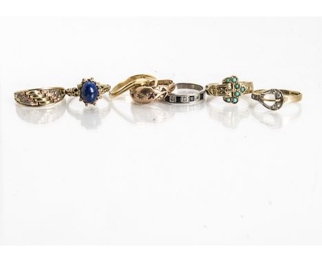 Four 9ct gold dress rings, comprising a three coloured basket example, a lapis lazuli ring, a gypsy set ruby and diamond and 