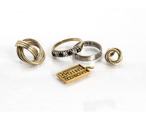 A small quantity of gold, including an 18ct gold engraved wedding band, ring size N, an 18ct gold earring, 18ct gold weight 4