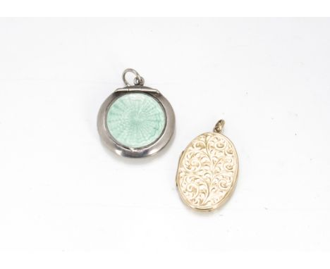 A 9ct gold oval locket with engraved decoration, together with a miniature silver and enamel compact with sea green engine tu