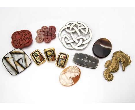 A Keswick School of Industrial Art polished pewter Arts and Crafts brooch, together with a terracotta Danish brooch by Bronds
