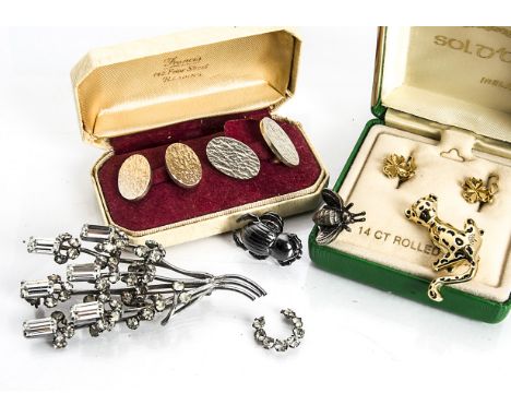A pair of 1960s Deakin &amp; Francis oval cufflinks, three Mulberry pin badges of a scarab, seated leopard and bee, paste set