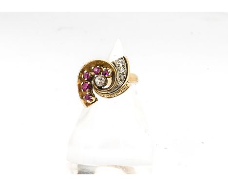 A continental gem set yellow gold retro style ring, with central paste stone surrounded by a spiral of rubies and diamonds on