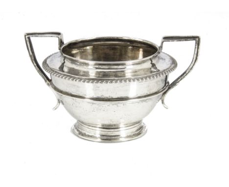 A George silver sugar basin by Pairpoint Brothers, the good gauge circular footed bowl with twin handles, London 1917, 11.6 o