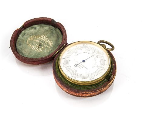 A late Victorian pocket barometer by Negretti &amp; Zambra, gilt 47mm case with number 26082, appears to function, in fitted 