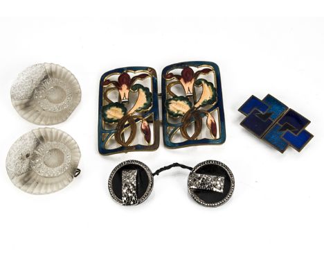 A quantity of Art Nouveau and Art Deco belt buckles, including a gilt metal and enamel floral example, an Art Deco geometric 