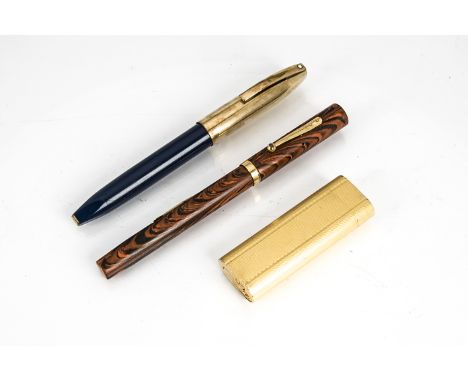 A vintage Watermans Ideal fountain pen, in marbled red and black, with 14ct gold nib, together with a Sheaffer's fountain pen