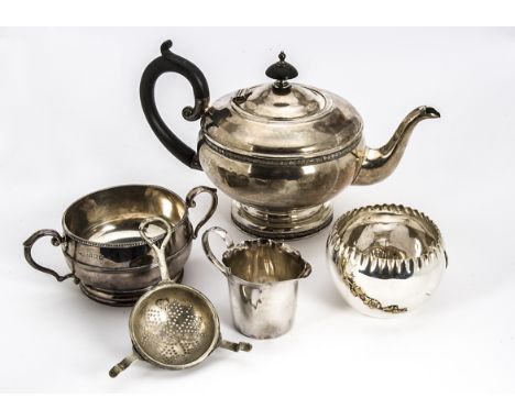 A George V silver teapot by HJAB, together with a silver sugar basin and a silver cream jug, 20 ozt, and a silver plated suga