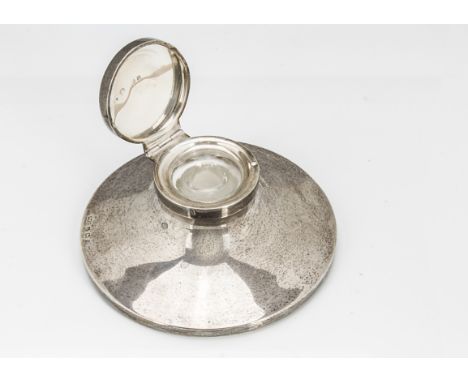 An Art Deco silver filled capstan inkwell  with glass liner, some typical dents and marks