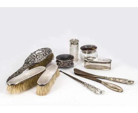 A group of Victorian and later dressing table items, including a pique trinket box and glass pot with pique lid, a pair of cl