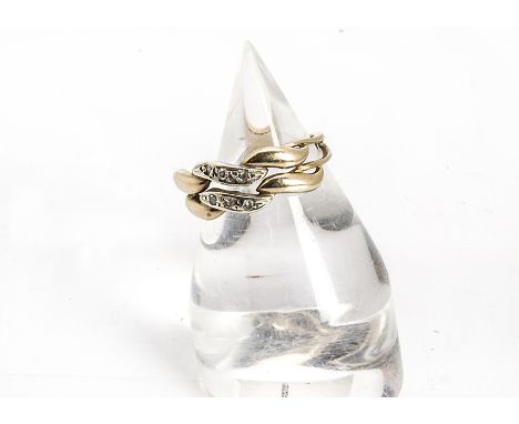 A diamond and turquoise dress ring, the band of five rose cut diamonds surrounded by a bezel of turquoise beads, ring size Q,