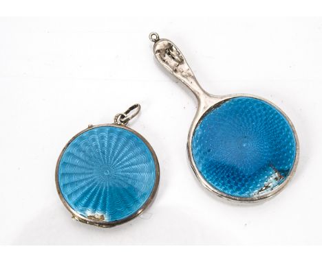 A continental white metal guilloche enamel circular locket, together with a matched silver miniature hand mirror, both af 