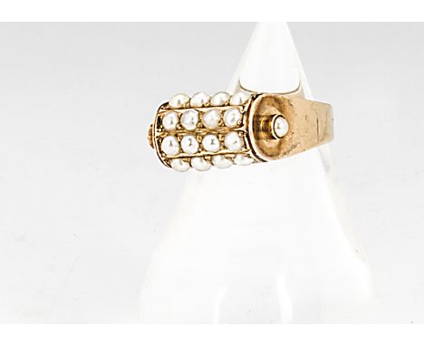 A continental yellow metal and seed pearl barrel shaped dress ring, the four bands of seed pearl with half cut pearl set shou