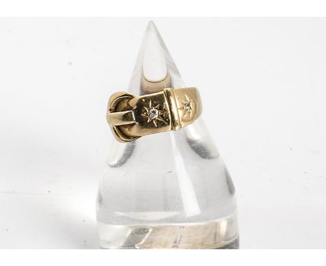 An Edwardian gentleman's diamond buckle ring, the old cut gypsy set diamonds within a buckle setting, ring size O, 4.6g 