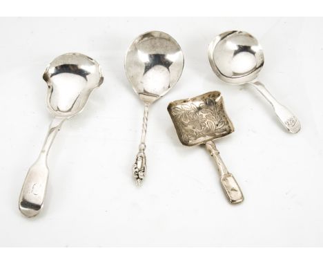 A group of four Georgian and Victorian silver tea caddy spoons, with examples by Charles Boyton, Stokes &amp; Ireland, Benjum