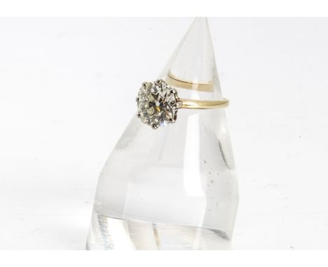 An old cut diamond solitaire, the cushion shaped diamond in an eight claw setting, on a yellow metal shank, diamond 3.34ct, S