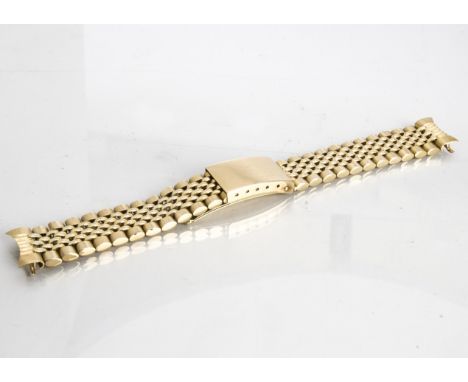 An 18ct gold gate replacement watch strap, of tapered form, with central five link band, surrounded by oval links, watch lug 