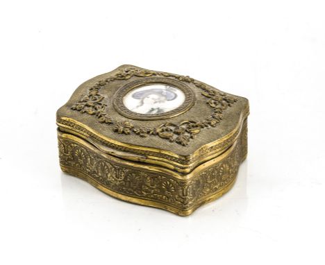 A late 19th century gilt trinket box, having ivory circular painted with a painted portrait of a young lady, 9.5cm wide 