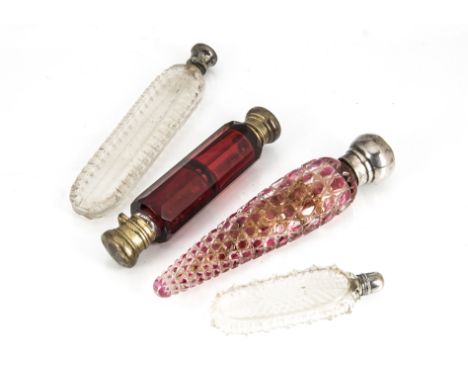 Four Georgian and Victorian cut glass scent bottles, AF, including a ruby double compartment example, a tapered flashed body 