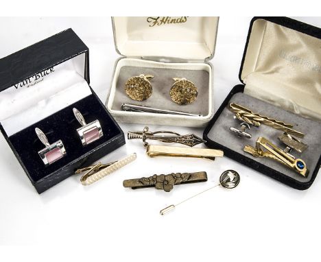 A large collection of gentleman's cufflinks, tie slides etc including Beano, Cyprus, paste set, tiger's eye and others 