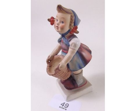 A Hummel figure girl with basket