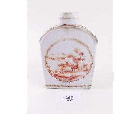 An early 19th century Chinese export tea caddy decorated in iron red