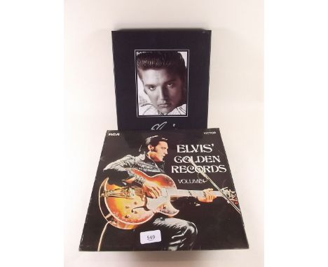 A box of Elvis replica memorabilia 