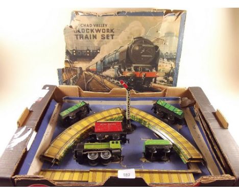 A Chad Valley clockwork train set, boxed (the box a/f)