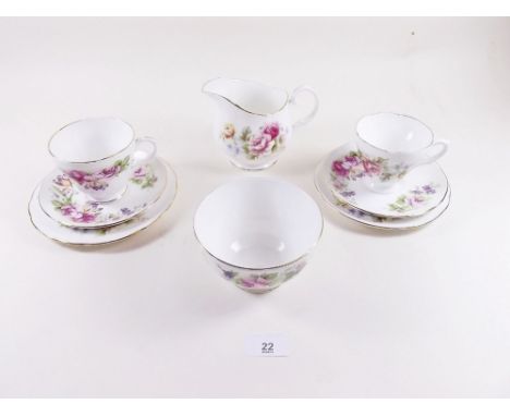 A Duchess tea service comprising: two cake plates, one milk jug, two sugar bowls, four cups and saucers, six tea plates and s