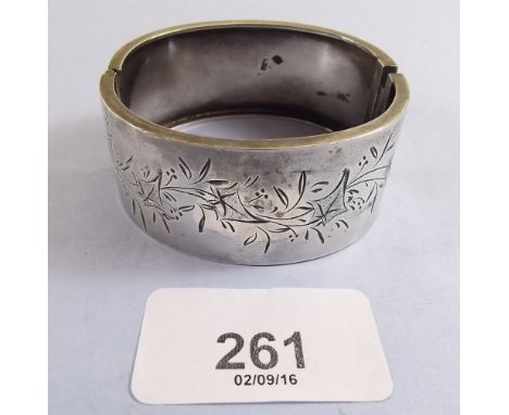 A Victorian silver engraved bangle 