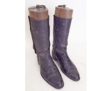 A pair of gentlemans leather hunting boots and wooden trees 