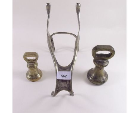 Two Victorian brass bell weights and silver plated wine bottle holder 