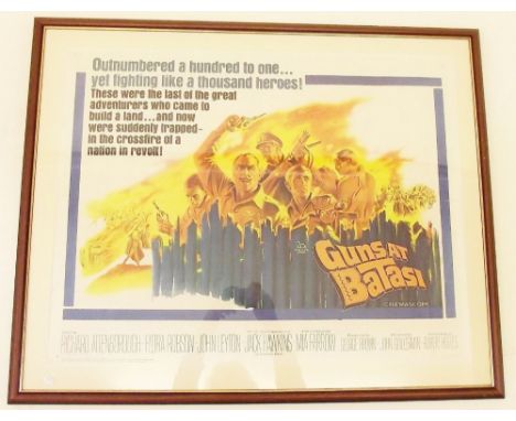 A vintage movie poster 'Guns at Batasi' - 53 x 69cm