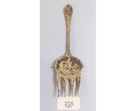 A Dutch white metal cake serving fork decorated windmill 