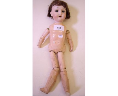 A late 19th century/early 20th century bisque headed doll with jointed composition body marked '24 Germany R 6/0 P' - 33cm