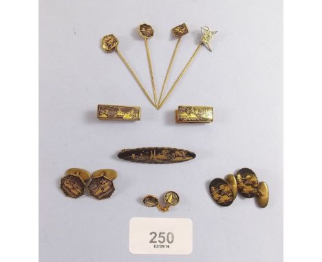 A group of Japanese Komai style jewellery comprising brooch, stick pins, two tie clips, two pair of cufflinks and collar stud