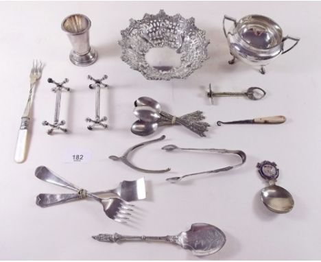 A group of silver plated items and cutlery 