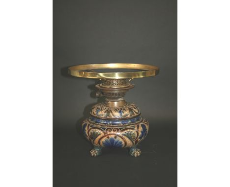 DOULTON LAMBETH OIL LAMP the stoneware base of circular form painted with borders of flowers and leaves, and on paw feet. Wit