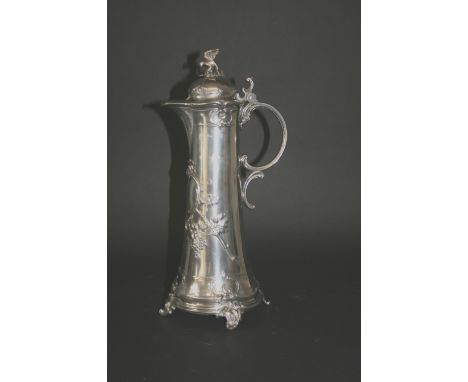 WMF CLARET JUG the tall slender jug designed with grapes and vines, and with a bird mounted finial. Marked, WMF,B. 13ins (33c