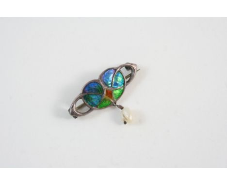 AN ART NOUVEAU SILVER AND ENAMEL BROOCH BY WILLIAM HENRY HASELER set with blue and green enamel decoration, with pearl drop, 