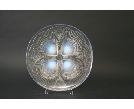 LALIQUE DISH the opalescent dish in the Coquilles design. Marked, R Lalique, France, No 3009. 11 3/4ins (30cms) diameter