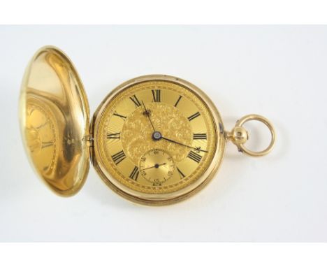 AN 18CT. GOLD FULL HUNTING CASED POCKET WATCH the gold foliate dial with Roman numerals and subsidiary seconds dial (glass mi