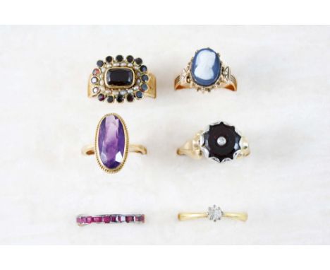 A GARNET AND PEARL CLUSTER RING set in 22ct. gold, size N, an amethyst single stone ring, set in 9ct. gold, size M, a diamond