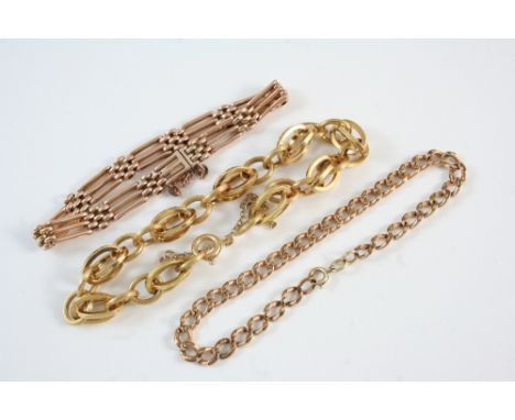 A 9CT. GOLD GATE LINK BRACELET with concealed clasp, 9.8 grams, together with an 18ct. gold fancy link bracelet, 14.5 grams, 